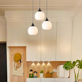 Modern Black 3-Light GLobe White Glass Pendant Light Image - 4