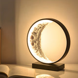 Modern Black Creative Crescent Moon Circular Table Lamp Image - 1