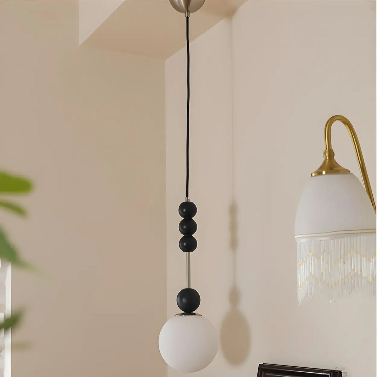 Modern Black Matte White Glass Globe Pendant Light Image - 1