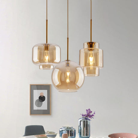 Modern Brass Amber Clear Glass Globe Pendant Lights Image - 1