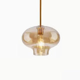 Modern Brass Amber Clear Glass Globe Pendant Lights Image - 13