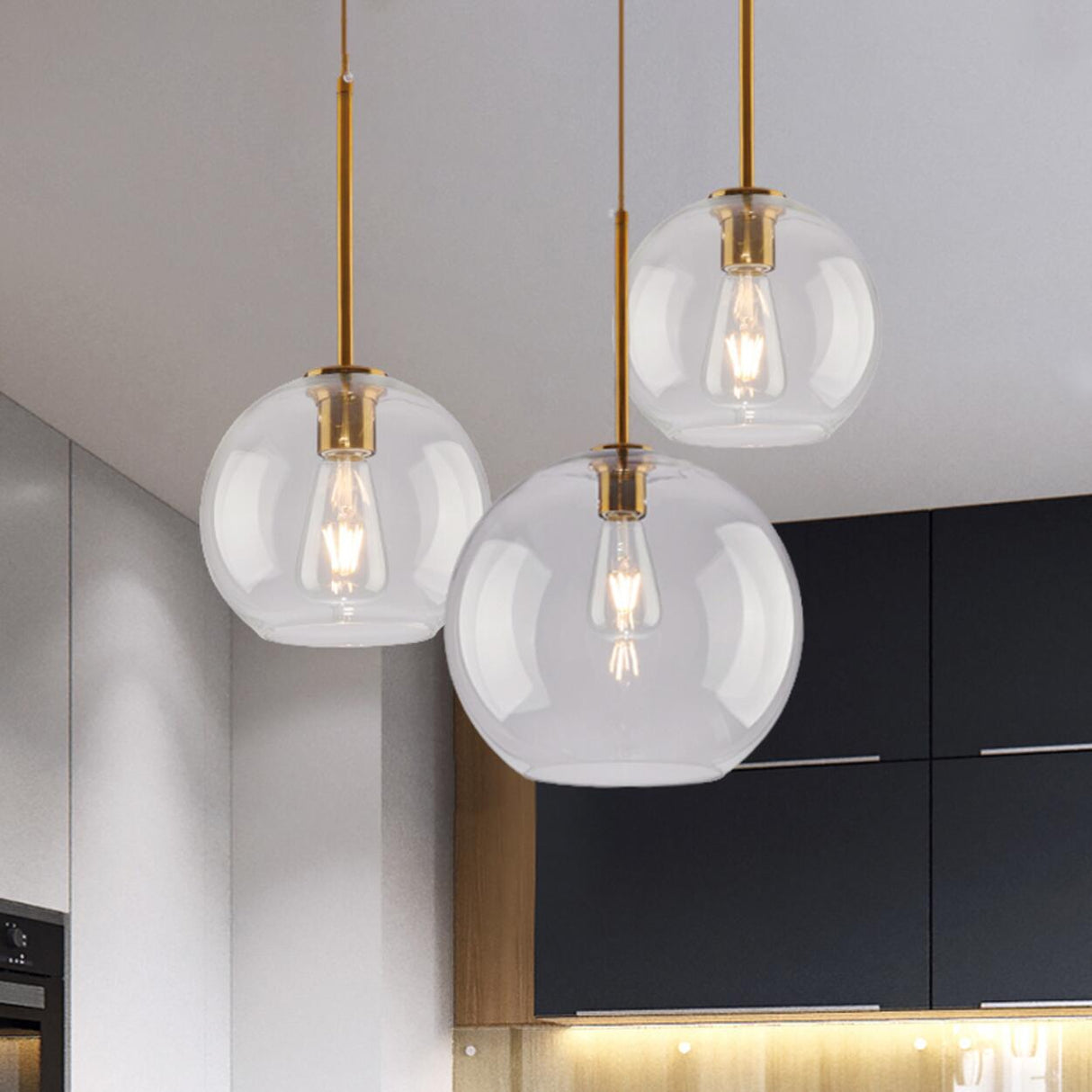 Modern Brass Amber Clear Glass Globe Pendant Lights Image - 5