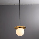 Modern Brass Disc White Glass Globe Pendant Light Image - 11