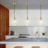 Modern Brass Ring White Glass Globe Kitchen Pendant Light Image - 3