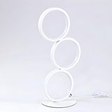 Modern Chic Triple Circle LED Metal Frame Table Lamp Image - 6