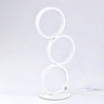 Modern Chic Triple Circle LED Metal Frame Table Lamp Image - 6