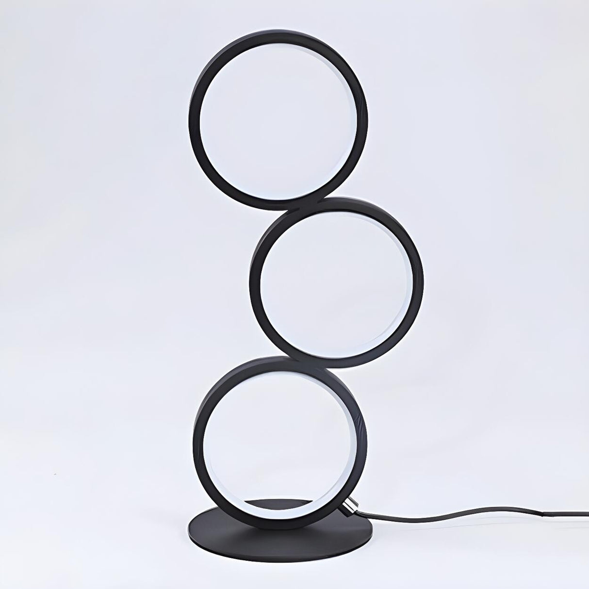 Modern Chic Triple Circle LED Metal Frame Table Lamp Image - 7