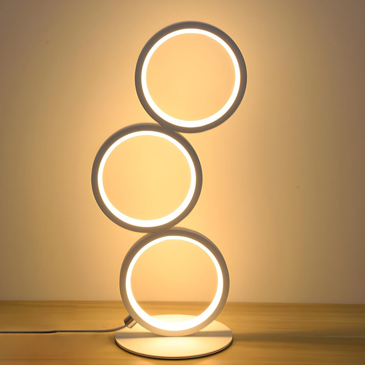 Modern Chic Triple Circle LED Metal Frame Table Lamp Image - 8