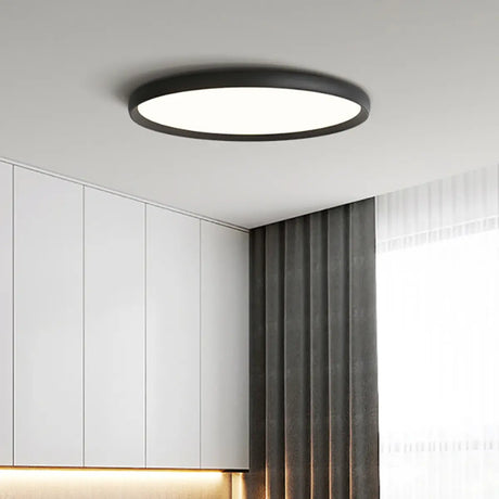 Bedroom Simplistic Black Circular LED Flush Mount Light Image - 1