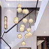 Modern Clear Glass Clobe Cluster Stairwell Pendant Light Image - 1