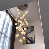 Modern Clear Glass Clobe Cluster Stairwell Pendant Light Image - 4