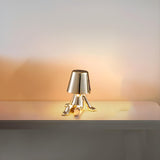 Modern Creative Mini Golden Man Metal Study Table Lamp Image - 4