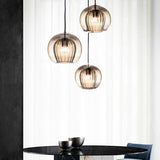 Modern Dining Room Clear Glass Globe Pendant Light Image - 10