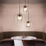 Modern Dining Room Clear Glass Globe Pendant Light Image - 4