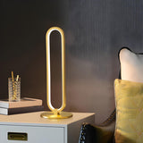 Modern Elegant Oval Geometric Metal LED Table Lamp Image - 2