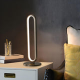 Modern Elegant Oval Geometric Metal LED Table Lamp Image - 3