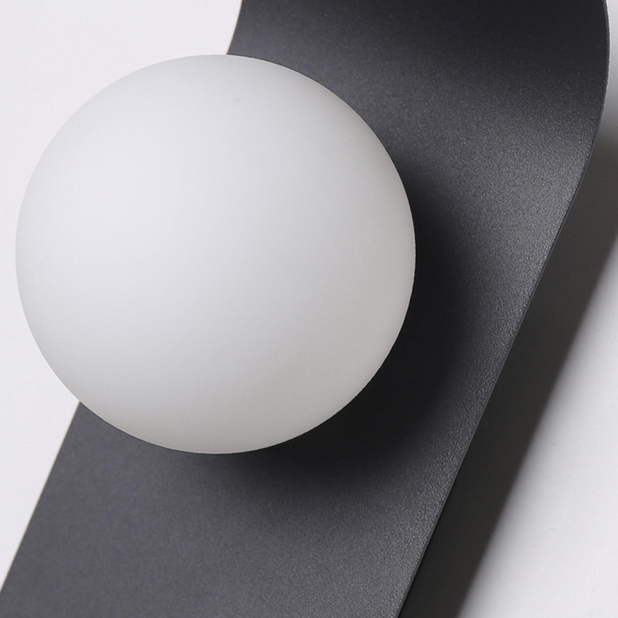 Modern Frosted Glass Globe Black Curved Wall Sconce Image - 14