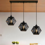 Modern Geometric Black Carved Metal Hexagonal Pendant Light Image - 1