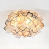 Dreamy Bedroom White Geometric Petal Flush Mount Light Image - 15