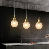 Modern Globe Transparent Brass Clear Glass Pendant Light Image - 3