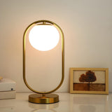 Modern Gold Globe Shade Oval Metal Frame Table Lamp Image - 1