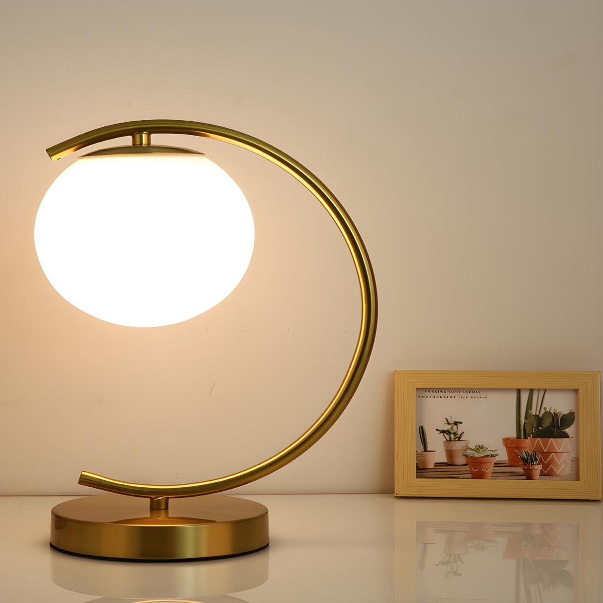 Modern Gold Globe Shade Oval Metal Frame Table Lamp Image - 4