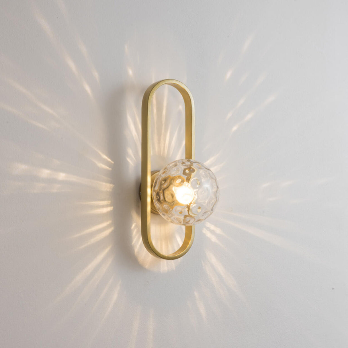 Modern Gold Globe Textured Glass Wall Sconce Image - 10