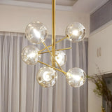 Modern Gold Sputnik Clear Glass Globe Vertical Chandelier Image - 7