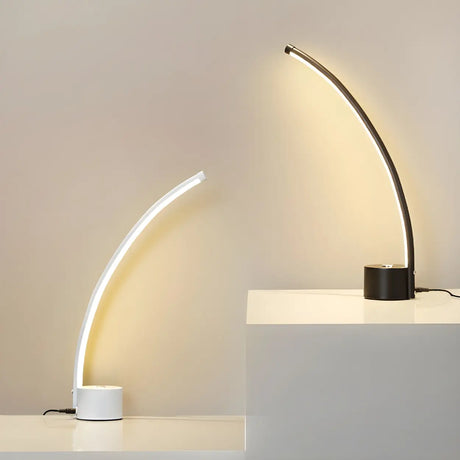 Modern Minimalist Arc Metal LED Table Lamp Bedroom Image - 1