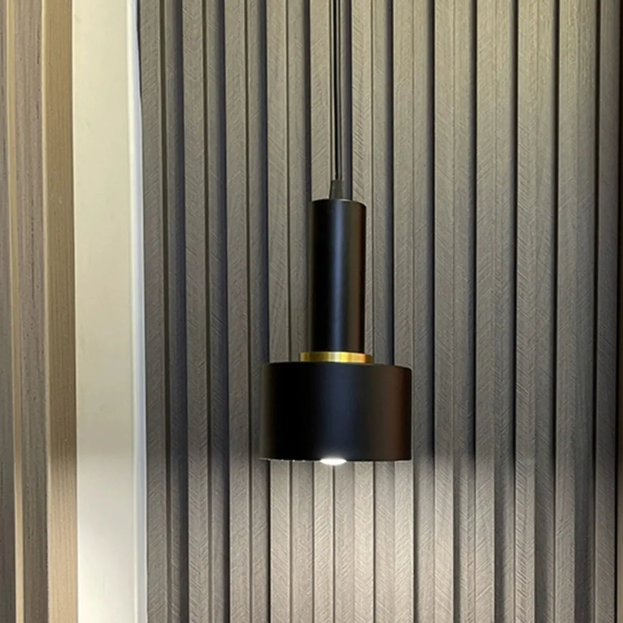 Modern Minimalist Black Gold Bedroom Cylinder Pendant Light Image - 8