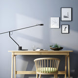 Modern Minimalist Black Linear Iron LED Table Lamp Image - 3