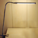 Modern Minimalist Linear Adjustable Metal Table Lamp Image - 2