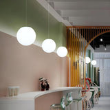 Modern Minimalist Restaurant White Globe Pendant Light Image - 3