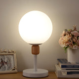 Modern Minimalist White Glass Globe Bedside Table Lamp Image - 1