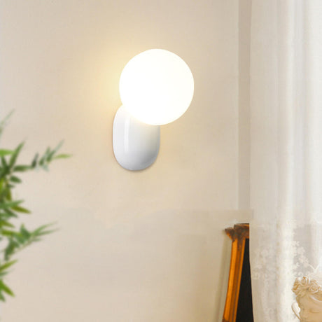 Modern Minimalist White Globe Resin LED Wall Light Image - 1