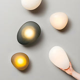 Modern Organic Glass Pebble LED Wall Light Fixture Image - 1