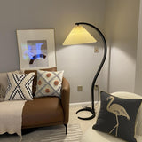 Modern Pleated Shade and Curved Black Floor Lamp Image - 1