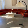 Modern Pleated Shade and Curved Black Floor Lamp Image - 2