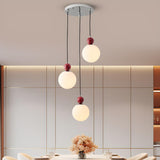 Modern Red Globe White Glass Dining Room Pendant Light Image - 1