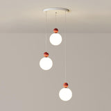 Modern Red Resin Triple Glass Globe Pendant Light Image - 9