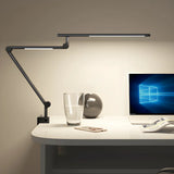 Modern Simple Black Adjustable Metal Arm Table Lamp Image - 1