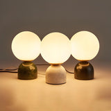 Modern Simple White Globe Ceramic Black Base Table Lamp Image - 11