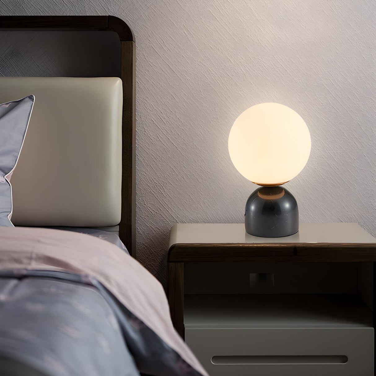 Modern Simple White Globe Ceramic Black Base Table Lamp Image - 4