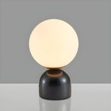 Modern Simple White Globe Ceramic Black Base Table Lamp Image - 9