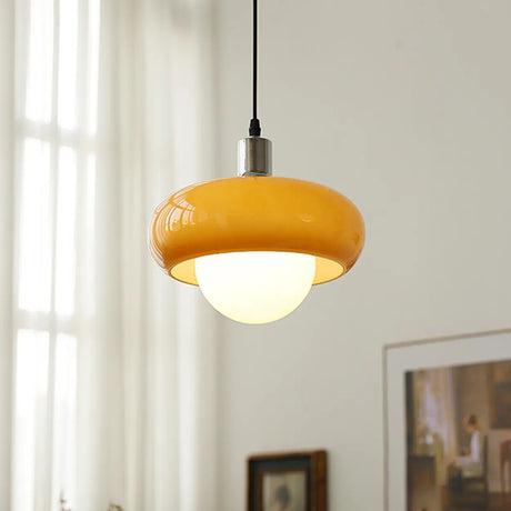 Modern Sleek Round Yellow Glass Globe Pendant Light Image - 1