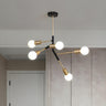 Modern Sputnik Exposed Bulbs Black and Gold Chandelier Image - 1