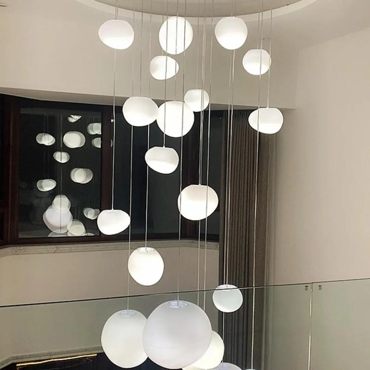 Modern Stairwell White Globe Cluster Pendant Light Image - 1