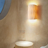 Modern Textured Cylindrical Ceramic Wall Sconce Image - 2