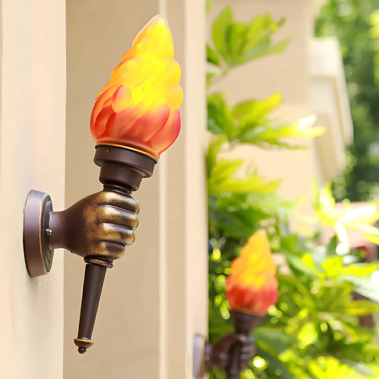 Modern Torch Shape Orange Glass Outdoor Wall Sconce Image - 1