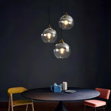 Modern Translucent Globe Glass Triple Pendant Light Image - 4